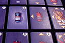 Thumbnail of the photo of twelve Gun It vehicle tiles, centered on the crew car, a hostile car, and a tank